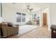 Cozy living room with natural light, tile floors, a ceiling fan and comfortable seating at 4284 N 154Th Ave, Goodyear, AZ 85395