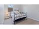 Cozy bedroom with comfortable bedding and neutral decor, creating a relaxing space at 4330 S Neutron --, Mesa, AZ 85212