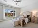 Cozy bedroom with a large window, neutral tones, and comfortable furnishings at 4330 S Neutron --, Mesa, AZ 85212