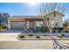 Charming single-story home featuring a well-manicured front yard, desert landscaping, and a two-car garage at 4330 S Neutron --, Mesa, AZ 85212