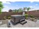 Backyard hot tub and landscaped patio area, perfect for relaxing and entertaining at 4330 S Neutron --, Mesa, AZ 85212