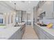 Sleek kitchen with gray cabinets, quartz countertops, and stainless steel appliances at 4330 S Neutron --, Mesa, AZ 85212