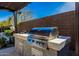 Close up of a built-in stainless steel grill in an outdoor kitchen space, ideal for cooking and outdoor gatherings at 4330 S Neutron --, Mesa, AZ 85212