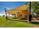 Architectural stage structure with shade canopies, set in manicured lawns, a stylish venue for outdoor activities at 4330 S Neutron --, Mesa, AZ 85212