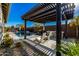 Inviting outdoor space with a pergola, lounge chairs, and a view of the pool and spa at 4330 S Neutron --, Mesa, AZ 85212