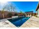 Clear, refreshing swimming pool surrounded by desert landscaping and privacy fencing at 4330 S Neutron --, Mesa, AZ 85212