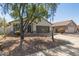 Inviting single-story home featuring desert landscaping and a two-car garage at 43945 W Juniper Ave, Maricopa, AZ 85138