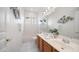 Bathroom featuring double vanity, tiled floors, and modern fixtures at 4831 E Annette Dr, Scottsdale, AZ 85254