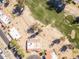 An aerial view of the neighborhood showcasing the surrounding golf course and desert landscape at 4843 E Ajo Cir, Phoenix, AZ 85044