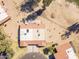 Expansive aerial view of a home with desert landscaping and a red tiled roof at 4843 E Ajo Cir, Phoenix, AZ 85044