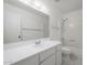 Bright, well-lit bathroom with a large mirror, white cabinets and modern shower/tub at 4843 E Ajo Cir, Phoenix, AZ 85044