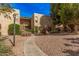 Charming exterior view showcases well-maintained landscaping and inviting walkways to the property at 4950 N Miller Rd # 119, Scottsdale, AZ 85251