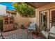 Charming outdoor patio featuring comfortable seating, decorative plants, and a peaceful, secluded ambiance at 4950 N Miller Rd # 119, Scottsdale, AZ 85251