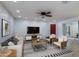 Bright living room with modern furniture, a ceiling fan, and stylish rug at 5223 N 24Th St # 108, Phoenix, AZ 85016