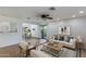 Cozy living room with natural light, a comfortable sofa, and an open floor plan at 5223 N 24Th St # 108, Phoenix, AZ 85016