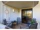 Covered patio featuring stylish chairs and plants, perfect for outdoor living at 5223 N 24Th St # 108, Phoenix, AZ 85016