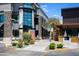 Retail building exterior with stone accents, a directory, and outdoor greenery at 5223 N 24Th St # 108, Phoenix, AZ 85016