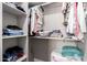 Organized closet with ample shelving and hanging space for clothes and accessories at 5223 W Lewis Ave, Phoenix, AZ 85035