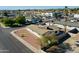 Aerial view of a home with a landscaped yard in a quiet neighborhood at 5942 W Seldon Ln, Glendale, AZ 85302