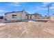 Spacious backyard featuring a covered patio, offering a versatile outdoor space at 5942 W Seldon Ln, Glendale, AZ 85302