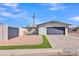 Attractive one-story home featuring a large two-car garage and drought-tolerant landscaping at 5942 W Seldon Ln, Glendale, AZ 85302