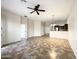 Spacious living room with tile floors, ceiling fan, and plenty of natural light at 6202 E Mckellips Rd # 227, Mesa, AZ 85215