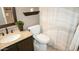 Bathroom featuring a toilet and vanity with granite countertop at 7500 E Deer Valley Rd # 59, Scottsdale, AZ 85255