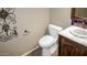 Well-designed powder room with a stylish sink and tiled backsplash at 7500 E Deer Valley Rd # 59, Scottsdale, AZ 85255