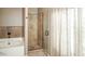 Bright bathroom featuring a tile shower and soaking tub at 7500 E Deer Valley Rd # 59, Scottsdale, AZ 85255