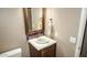 Charming powder room features unique sink with decorative tile and fixtures at 7500 E Deer Valley Rd # 59, Scottsdale, AZ 85255