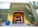 Entrance to Isabella's Kitchen with ivy covered walls at 7500 E Deer Valley Rd # 59, Scottsdale, AZ 85255