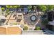 Aerial shot of the backyard courtyard, including a fountain, seating, and landscaped gardens at 7504 N Via De La Siesta --, Scottsdale, AZ 85258