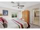 Cozy bedroom with neutral tones, a ceiling fan, and a closet at 7504 N Via De La Siesta --, Scottsdale, AZ 85258