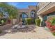 Inviting courtyard featuring a charming fountain, lush greenery, and a cozy seating area at 7504 N Via De La Siesta --, Scottsdale, AZ 85258