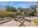 Serene courtyard featuring comfortable seating, a decorative fountain, and lush landscaping at 7504 N Via De La Siesta --, Scottsdale, AZ 85258