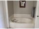 Bathroom featuring a large soaking tub at 7887 N 16Th St # 227, Phoenix, AZ 85020