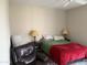 Cozy bedroom features a comfortable chair, soft lighting, and a peaceful ambiance at 7887 N 16Th St # 227, Phoenix, AZ 85020