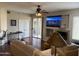 Bright living room featuring hardwood floors, a sliding glass door, and comfortable seating at 7887 N 16Th St # 227, Phoenix, AZ 85020