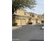 Street view of several homes with closed garage doors in a well-maintained neighborhood at 7887 N 16Th St # 227, Phoenix, AZ 85020