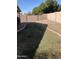 Backyard featuring a blend of gravel and newly installed grass and surrounded by a block fence for added privacy at 8648 W Fargo Dr, Peoria, AZ 85382