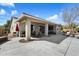 Large covered back patio with dining and seating areas, offering a great space for outdoor gatherings at 9010 W Ruth Ave, Peoria, AZ 85345