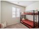 Bedroom equipped with bunk beds, offering a functional layout at 9010 W Ruth Ave, Peoria, AZ 85345