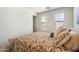 Bedroom featuring plush carpeting, a neutral palette, and natural light from the window at 9010 W Ruth Ave, Peoria, AZ 85345