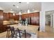 Modern kitchen featuring granite countertops, stainless steel appliances, and stylish pendant lighting at 9010 W Ruth Ave, Peoria, AZ 85345