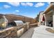 Outdoor kitchen featuring a built-in grill and stone accents, ideal for entertaining in the backyard at 9010 W Ruth Ave, Peoria, AZ 85345