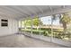 The covered patio offers panoramic views of the green outdoor space at 11047 N Coggins Dr, Sun City, AZ 85351