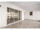 This covered patio space provides additional space with great outdoor views at 11047 N Coggins Dr, Sun City, AZ 85351