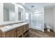 Bathroom with a double sink vanity and a glass enclosed shower at 1426 E 19Th Ave, Apache Junction, AZ 85119