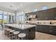 Gourmet kitchen with stainless steel appliances, quartz countertops, and an eat-in island at 15921 E Ridgestone Dr, Fountain Hills, AZ 85268