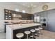 Bright and airy kitchen with quartz countertops, stainless steel appliances, and an eat-in island at 15921 E Ridgestone Dr, Fountain Hills, AZ 85268